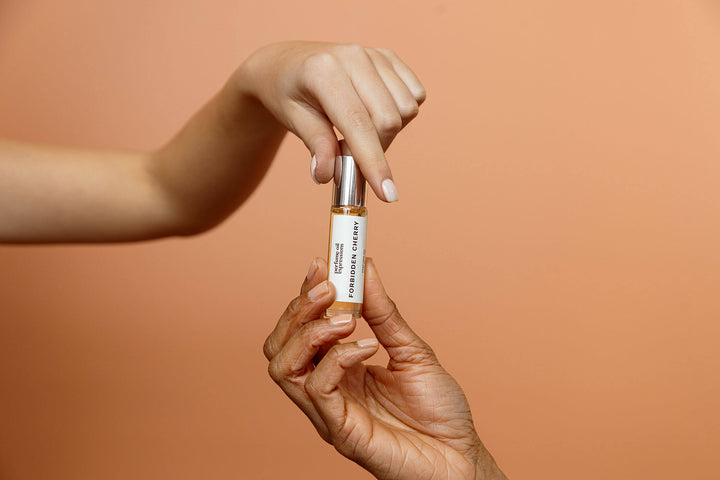 Perfume oil dupe for Lost Cherry, featuring a blend of fruity cherry and warm, indulgent spices, perfect for those seeking an affordable, long-lasting luxury fragrance.